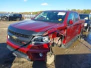 ✅ 2018 Chevrolet Colorado 4WD Z71 • VIN: 1GCGTDEN1J1103196 • Лот: 43483500. Опубликован ранее на IAAI с пробегом 98 044 миль. Бесплатный доступ к архиву аукционных продаж из США и подробный отчёт об истории автомобиля на DreamBid. Изображение 2.