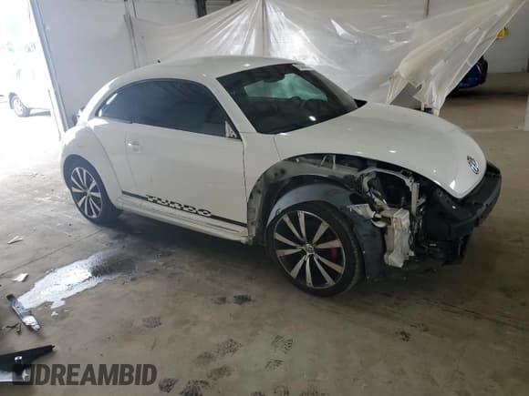 ✅ 2012 Volkswagen Beetle Turbo • VIN: 3VWVA7AT1CM603493 • Lot: 67586885. Listed on Copart with 97,207 mi. Free auction sales archive from the USA and detailed vehicle history report at DreamBid. Image 4.