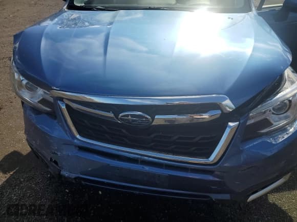 ✅ 2018 Subaru Forester Touring • VIN: JF2SJAWCXJH445928 • Лот: 64205985. Опубликован ранее на Copart с пробегом 69 609 миль. Бесплатный доступ к архиву аукционных продаж из США и подробный отчёт об истории автомобиля на DreamBid. Изображение 11.