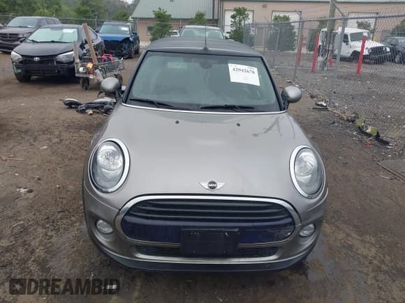 ✅ 2016 MINI Convertible • VIN: WMWWG5C52G3A83417 • Lot: 42942678. Listed on IAAI with 83,428 mi. Free auction sales archive from the USA and detailed vehicle history report at DreamBid. Image 13.