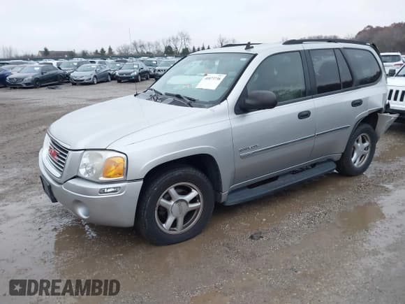 ✅ 2006 GMC Envoy SLT • VIN: 1GKDT13SX62342147 • Lot: 40873738. Listed on IAAI with 159,092 mi. Free auction sales archive from the USA and detailed vehicle history report at DreamBid. Image 2.