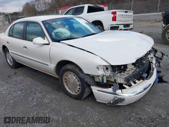 ✅ 1998 Lincoln Continental • VIN: 1LNFM97VXWY619313 • Lot: 41477852. Listed on IAAI with 158,973 mi. Free auction sales archive from the USA and detailed vehicle history report at DreamBid. Image 1.