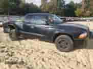 2003 Dodge Dakota Sport z VIN 1D7HL32N73S368162, wystawiony jako Copart lot #76056254 z przebiegiem 228 099 mil mil oraz Szkoda całkowita • Salvage title. Historia ofert i sprzedaży dostępna na DreamBid. Obrazek 4.