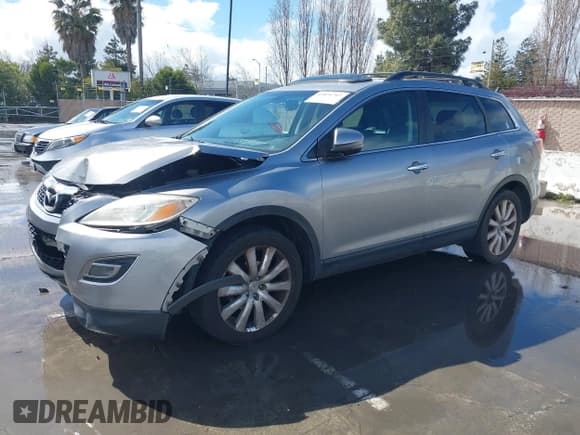 ✅ 2010 Mazda CX-9 Touring • VIN: JM3TB3MV8A0225855 • Лот: 41826707. Опубликован ранее на IAAI с пробегом 181 921 миль. Бесплатный доступ к архиву аукционных продаж из США и подробный отчёт об истории автомобиля на DreamBid. Изображение 2.