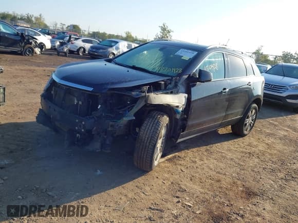 ✅ 2015 Cadillac SRX Luxury Collection • VIN: 3GYFNBE39FS611246 • Lot: 43327440. Listed on IAAI with 113,077 mi. Free auction sales archive from the USA and detailed vehicle history report at DreamBid. Image 2.