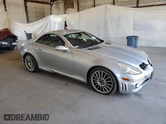 ✅ 2006 Mercedes-Benz SLK 55 AMG • VIN: WDBWK73F16F120908 • Лот: 86287825. Опубликован ранее на Copart с пробегом 122 087 миль. Бесплатный доступ к архиву аукционных продаж из США и подробный отчёт об истории автомобиля на DreamBid. Изображение 4.