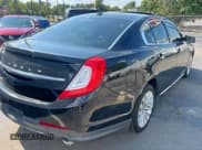 ✅ 2015 Lincoln MKS • VIN: 1LNHL9DK7FG602531 • Lot: 84918005. Wystawiony na Copart z przebiegiem 162 977 mil. Bezpłatny archiwum sprzedaży aukcyjnych z USA i szczegółowy raport historii pojazdu na DreamBid. Zdjęcie 4.