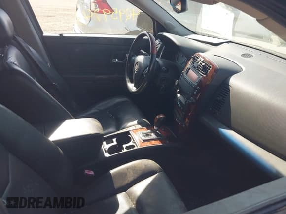 ✅ 2006 Cadillac SRX • VIN: 1GYEE637260222335 • Лот: 42959743. Опубликован ранее на IAAI с пробегом 94 826 миль. Бесплатный доступ к архиву аукционных продаж из США и подробный отчёт об истории автомобиля на DreamBid. Изображение 5.