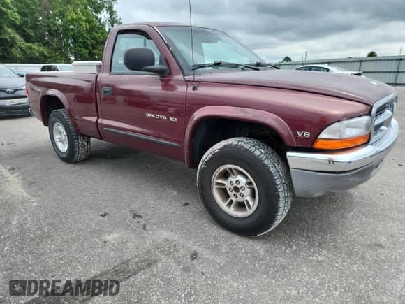 2000 Dodge Dakota Sport z VIN 1B7GG26N5YS650791, wystawiony jako Copart lot #63601765 z przebiegiem 80 841 mil mil oraz Szkoda całkowita • Salvage title. Historia ofert i sprzedaży dostępna na DreamBid. Obrazek 4.