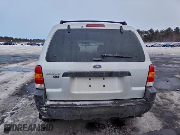 ✅ 2003 Ford Escape XLT Popular 2 • VIN: 1FMYU93133KB85553 • Lot: 95891575. Listed on Copart with 130,488 mi. Free auction sales archive from the USA and detailed vehicle history report at DreamBid. Image 6.