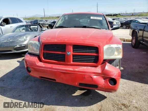 2006 Dodge Dakota SLT с VIN 1D7HE48N76S634016, выставлен на аукционе Copart как лот 54238774 с пробегом 233 035 миль миль и Списание • Salvage title. История ставок и продаж доступна на DreamBid. Изображение 5.