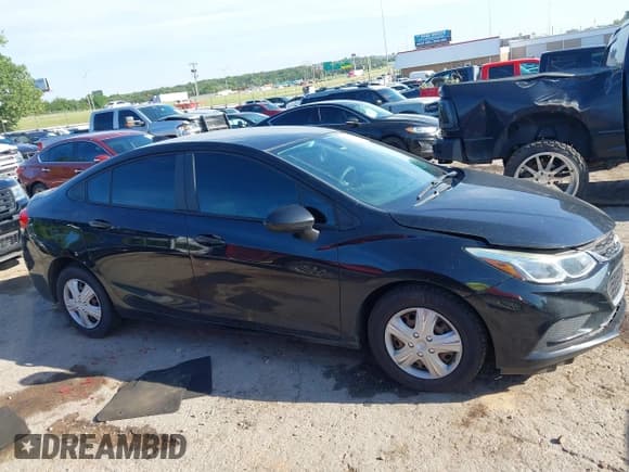 ✅ 2018 Chevrolet Cruze LS • VIN: 1G1BC5SM8J7135435 • Lot: 42811499. Listed on IAAI with 116,382 mi. Free auction sales archive from the USA and detailed vehicle history report at DreamBid. Image 13.