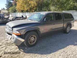 2002 Dodge Dakota SLT z VIN 1B7HL48N42S522901, wystawiony jako Copart lot #76783334 z przebiegiem 247 517 mil mil oraz Szkoda całkowita • Salvage title. Historia ofert i sprzedaży dostępna na DreamBid. Obrazek 1.