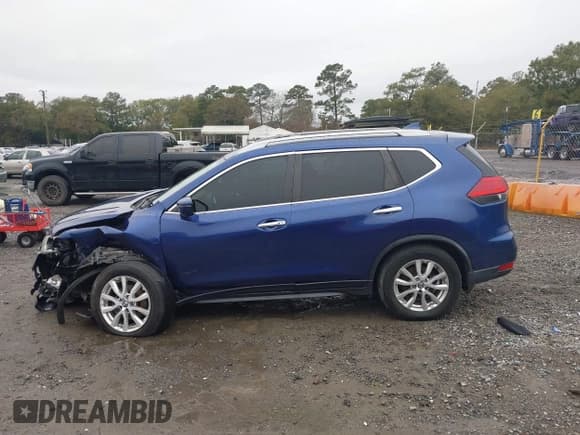 ✅ 2017 Nissan Rogue SL • VIN: 5N1AT2MV4HC870174 • Lot: 43817461. Listed on IAAI with 141,572 mi. Free auction sales archive from the USA and detailed vehicle history report at DreamBid. Image 13.