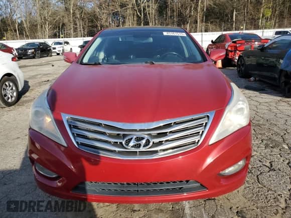 2013 Hyundai Azera с VIN KMHFH4JG6DA215531, выставлен на аукционе Copart как лот 45161515 с пробегом 95 575 миль миль и Списание • Salvage title. История ставок и продаж доступна на DreamBid. Изображение 5.