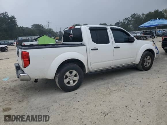 2012 Nissan Frontier SV with VIN 1N6AD0ER2CC433304, listed as a Copart auction lot 86213285 with 261,849 mi miles and Salvage title. Bid and sale history available at DreamBid. Image 3.