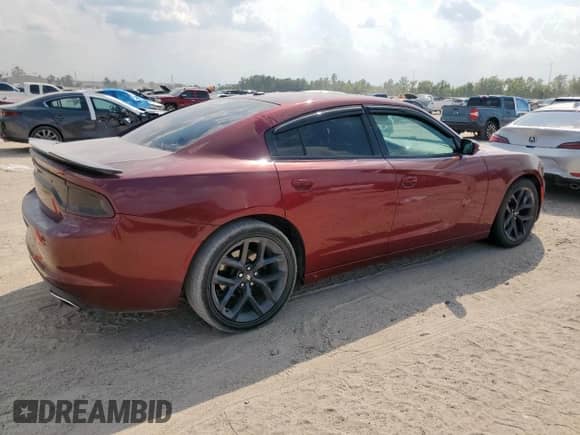 2019 Dodge Charger SXT with VIN 2C3CDXBG0KH657212, listed as a Copart auction lot 81458685 with 69,240 mi miles and Salvage title. Bid and sale history available at DreamBid. Image 3.