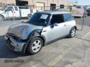 ✅ 2006 MINI Hardtop • VIN: WMWRC33536TJ79002 • Lot: 43794333. Listed on IAAI with 150,511 mi. Free auction sales archive from the USA and detailed vehicle history report at DreamBid. Image 2.