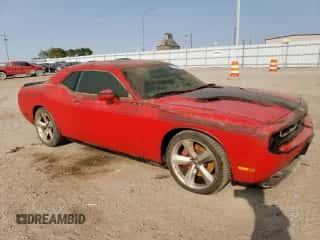2009 Dodge Challenger SRT-8 z VIN 2B3LJ74W29H569671, wystawiony jako Copart lot #71186264 z przebiegiem Nie podano mil oraz Szkoda całkowita • Salvage title. Historia ofert i sprzedaży dostępna na DreamBid. Obrazek 4.