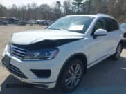 ✅ 2016 Volkswagen Touareg Lux • VIN: WVGEF9BP3GD004853 • Lot: 41905994. Listed on IAAI with 132,606 mi. Free auction sales archive from the USA and detailed vehicle history report at DreamBid. Image 2.