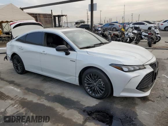 ✅ 2021 Toyota Avalon Hybrid XSE • VIN: 4T1EA1AB8MU001657 • Лот: 87883195. Опубликован ранее на Copart с пробегом 47 905 миль. Бесплатный доступ к архиву аукционных продаж из США и подробный отчёт об истории автомобиля на DreamBid. Изображение 4.