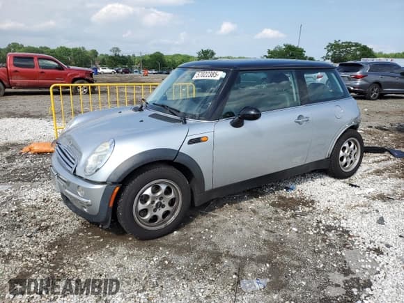 ✅ 2004 MINI Hardtop • VIN: WMWRC33434TJ56260 • Lot: 57022385. Wystawiony na Copart z przebiegiem 98 498 mil. Bezpłatny archiwum sprzedaży aukcyjnych z USA i szczegółowy raport historii pojazdu na DreamBid. Zdjęcie 1.