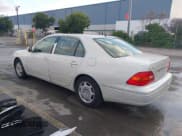 ✅ 2002 Lexus LS 430 • VIN: JTHBN30F320079813 • Lot: 43774572. Listed on IAAI with 251,286 mi. Free auction sales archive from the USA and detailed vehicle history report at DreamBid. Image 3.