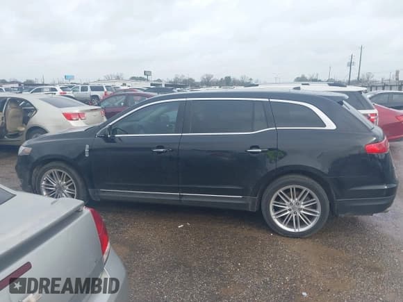 ✅ 2016 Lincoln MKT EcoBoost • VIN: 2LMHJ5AT3GBL01103 • Лот: 41563535. Опубликован ранее на IAAI с пробегом 122 250 миль. Бесплатный доступ к архиву аукционных продаж из США и подробный отчёт об истории автомобиля на DreamBid. Изображение 13.