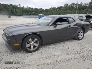 ✅ 2014 Dodge Challenger SXT • VIN: 2C3CDYAGXEH208471 • Lot: 69659914. Wystawiony na Copart z przebiegiem 125 335 mil. Bezpłatny archiwum sprzedaży aukcyjnych z USA i szczegółowy raport historii pojazdu na DreamBid. Zdjęcie 1.