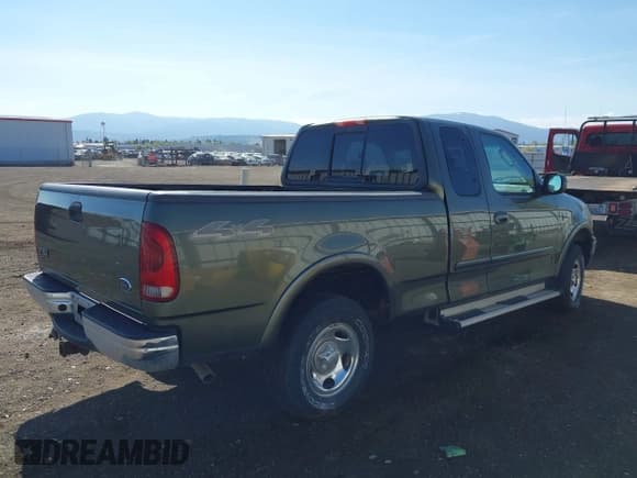 ✅ 2002 Ford F-150 XL • VIN: 2FTRX18W42CA61719 • Lot: 42146516. Wystawiony na IAAI z przebiegiem 99 774 mil. Bezpłatny archiwum sprzedaży aukcyjnych z USA i szczegółowy raport historii pojazdu na DreamBid. Zdjęcie 4.