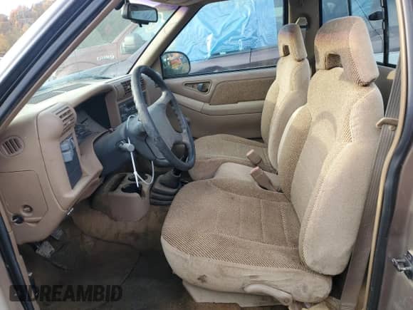 1996 Chevrolet S-10 с VIN 1GCCS1440TK187565, выставлен на аукционе Copart как лот 77079314 с пробегом 158 738 миль миль и Списание • Salvage title. История ставок и продаж доступна на DreamBid. Изображение 7.