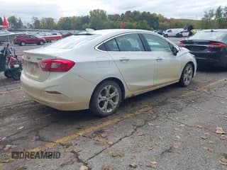 ✅ 2018 Chevrolet Cruze Premier • VIN: 1G1BF5SM3J7101054 • Лот: 43456753. Опубликован ранее на IAAI с пробегом 142 857 миль. Бесплатный доступ к архиву аукционных продаж из США и подробный отчёт об истории автомобиля на DreamBid. Изображение 4.