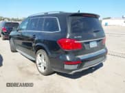 ✅ 2015 Mercedes-Benz GL 550 • VIN: 4JGDF7DE6FA552454 • Лот: 43497155. Опубликован ранее на IAAI с пробегом 139 467 миль. Бесплатный доступ к архиву аукционных продаж из США и подробный отчёт об истории автомобиля на DreamBid. Изображение 3.