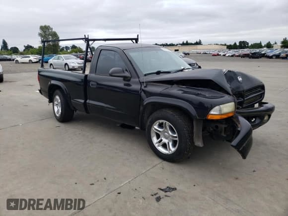 ✅ 2003 Dodge Dakota R/T • VIN: 1D7FL76Z13S166784 • Lot: 62141595. Wystawiony na Copart z przebiegiem 125 765 mil. Bezpłatny archiwum sprzedaży aukcyjnych z USA i szczegółowy raport historii pojazdu na DreamBid. Zdjęcie 4.