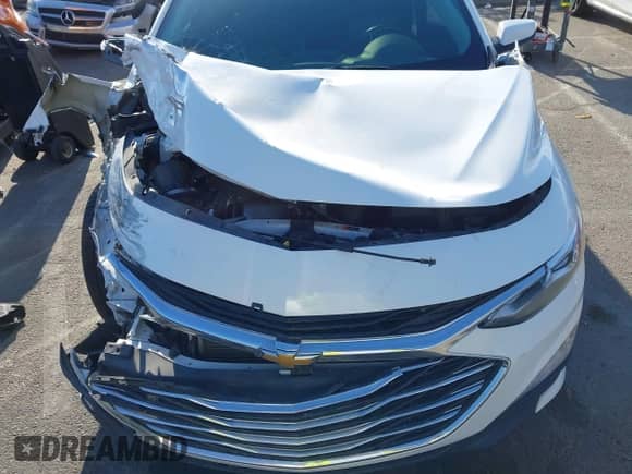 2020 Chevrolet Malibu Premier with VIN 1G1ZE5SX2LF095302, listed as a IAAI auction lot 43295858 with 103,997 mi miles and . Bid and sale history available at DreamBid. Image 6.