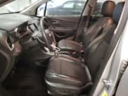 ✅ 2022 Chevrolet Trax LT • VIN: KL7CJPSM1NB525211 • Lot: 85825315. Listed on Copart with 77,332 mi. Free auction sales archive from the USA and detailed vehicle history report at DreamBid. Image 7.