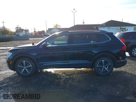 ✅ 2018 Volkswagen Tiguan SEL • VIN: 3VV2B7AX5JM133781 • Лот: 43591714. Опубликован ранее на IAAI с пробегом 87 547 миль. Бесплатный доступ к архиву аукционных продаж из США и подробный отчёт об истории автомобиля на DreamBid. Изображение 14.