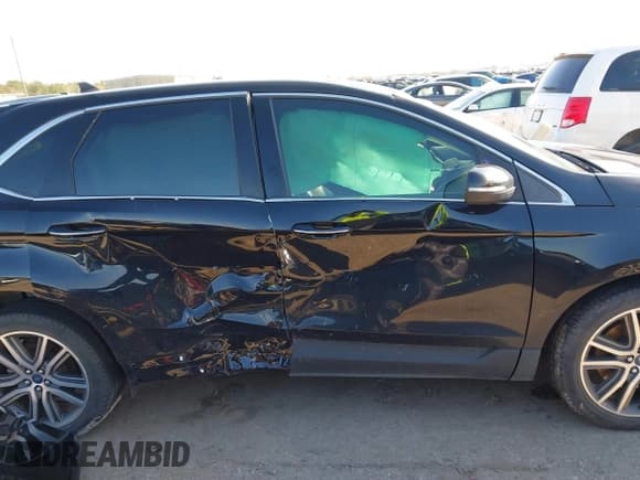 ✅ 2021 Ford Edge Titanium • VIN: 2FMPK3K97MBA35897 • Lot: 41629471. Wystawiony na IAAI z przebiegiem 55 647 mil. Bezpłatny archiwum sprzedaży aukcyjnych z USA i szczegółowy raport historii pojazdu na DreamBid. Zdjęcie 14.