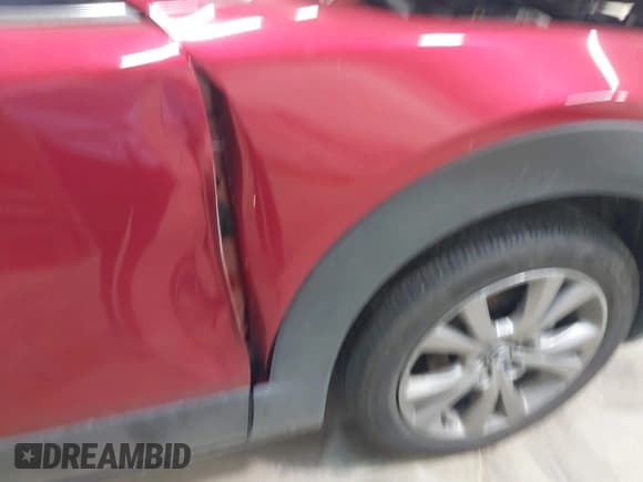 ✅ 2022 Mazda CX-30 S Premium • VIN: 3MVDMBDL0NM412458 • Lot: 43196761. Wystawiony na IAAI z przebiegiem 24 089 mil. Bezpłatny archiwum sprzedaży aukcyjnych z USA i szczegółowy raport historii pojazdu na DreamBid. Zdjęcie 18.