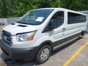 ✅ 2019 Ford Transit Passenger XL • VIN: 1FBZX2YM4KKB64966 • Lot: 42417498. Listed on IAAI with 157,311 mi. Free auction sales archive from the USA and detailed vehicle history report at DreamBid. Image 2.