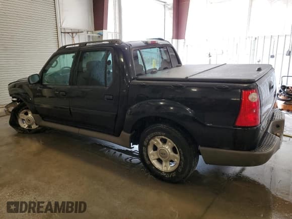 ✅ 2003 Ford Explorer Sport Trac XLS • VIN: 1FMZU77E53UA59804 • Lot: 86714275. Listed on Copart with 223,418 mi. Free auction sales archive from the USA and detailed vehicle history report at DreamBid. Image 2.