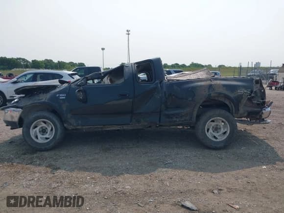 ✅ 1998 Ford F-150 XL • VIN: 1FTRX08L5WKC13654 • Lot: 42402628. Listed on IAAI with 128,541 mi. Free auction sales archive from the USA and detailed vehicle history report at DreamBid. Image 15.