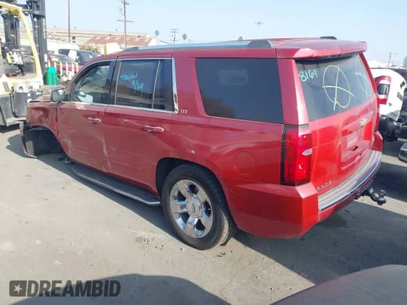 2015 Chevrolet Tahoe LTZ z VIN 1GNSCCKC4FR510792, wystawiony jako IAAI lot #43359343 z przebiegiem 215 235 mil mil oraz . Historia ofert i sprzedaży dostępna na DreamBid. Obrazek 3.