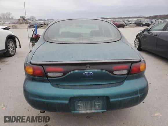 ✅ 1997 Ford Taurus G • VIN: 1FALP51U2VG299048 • Lot: 85742504. Wystawiony na Copart z przebiegiem 123 356 mil. Bezpłatny archiwum sprzedaży aukcyjnych z USA i szczegółowy raport historii pojazdu na DreamBid. Zdjęcie 6.