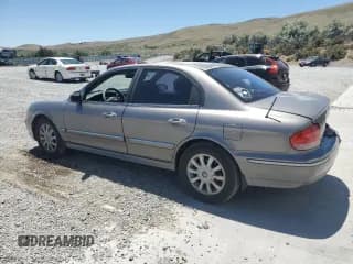 ✅ 2003 Hyundai Sonata GLS • VIN: KMHWF35H33A868884 • Lot: 61442535. Listed on Copart with 129,900 mi. Free auction sales archive from the USA and detailed vehicle history report at DreamBid. Image 2.