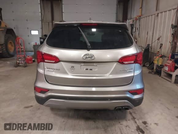 2017 Hyundai Santa Fe 2.0T z VIN 5XYZUDLA4HG424259, wystawiony jako IAAI lot #42657783 z przebiegiem 213 040 mil mil oraz . Historia ofert i sprzedaży dostępna na DreamBid. Obrazek 16.