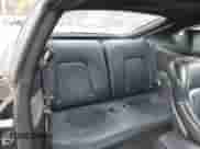 2003 Hyundai Tiburon GT with VIN KMHHN65F53U059705, listed as a IAAI auction lot 43573043 with 165,650 mi miles and . Bid and sale history available at DreamBid. Image 8.