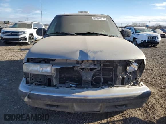 2000 Chevrolet Blazer LS with VIN 1GNDT13W6Y2206610, listed as a Copart auction lot 83566074 with 135,007 mi miles and Salvage title. Bid and sale history available at DreamBid. Image 5.