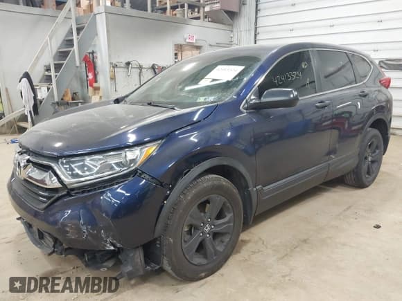 ✅ 2018 Honda CR-V LX • VIN: 2HKRW6H31JH233719 • Lot: 42413324. Listed on IAAI with 80,310 mi. Free auction sales archive from the USA and detailed vehicle history report at DreamBid. Image 18.
