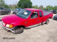 ✅ 2004 Ford F-150 XL • VIN: 2FTRX18W94CA24605 • Lot: 42948341. Listed on IAAI with Not provided. Free auction sales archive from the USA and detailed vehicle history report at DreamBid. Image 2.